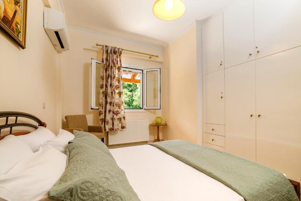 Postel nebo postele na pokoji v ubytování Villa Kardaris