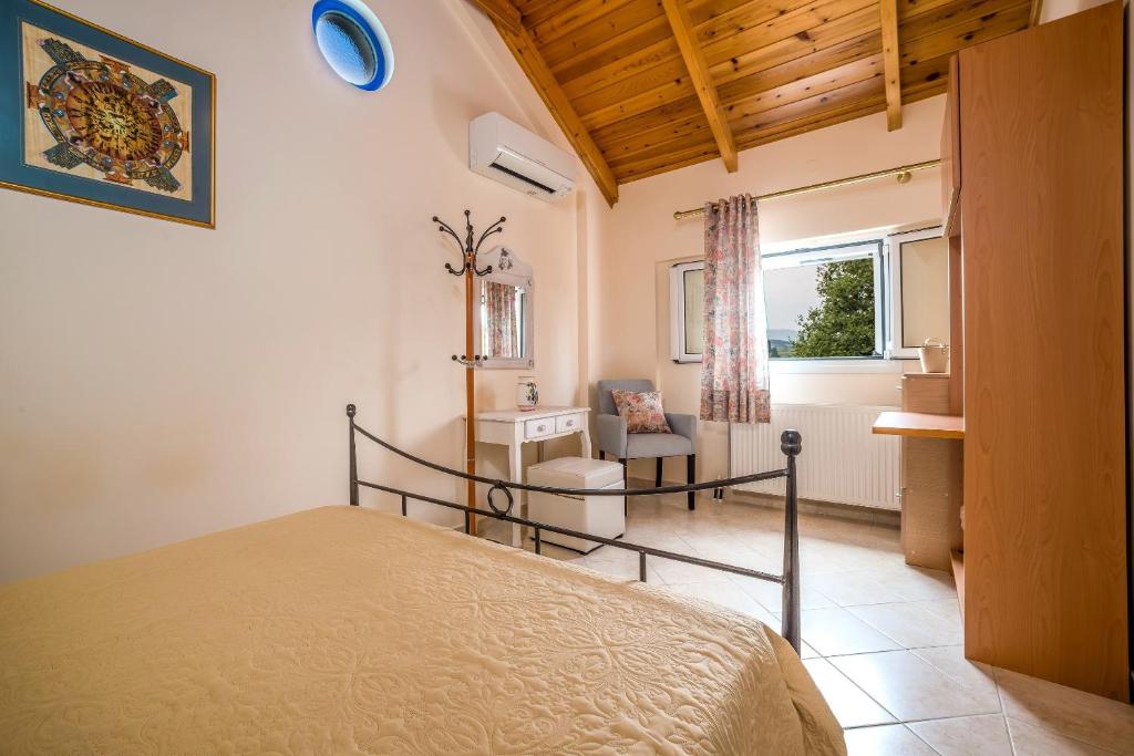 Postel nebo postele na pokoji v ubytování Villa Kardaris