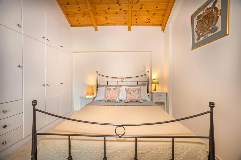 Postel nebo postele na pokoji v ubytování Villa Kardaris