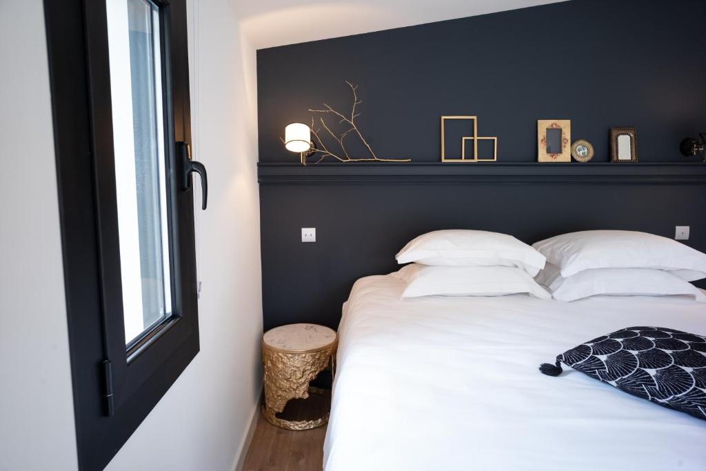 Postel nebo postele na pokoji v ubytování Villa Milanu