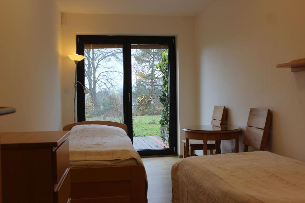 En eller flere senger på et rom på Apartmán Lipánek