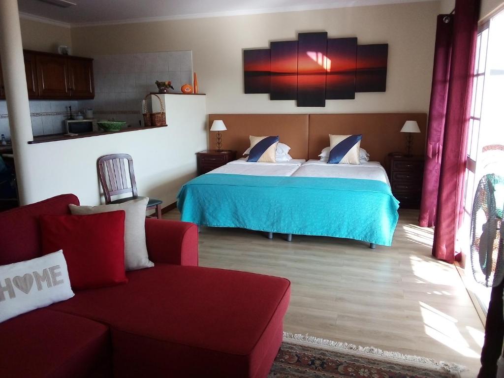 Postel nebo postele na pokoji v ubytování Apartments Vista Oceano