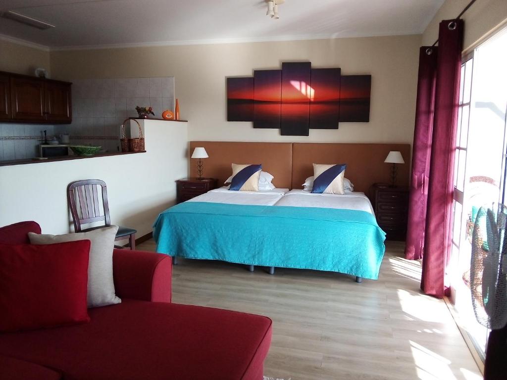 Postel nebo postele na pokoji v ubytování Apartments Vista Oceano