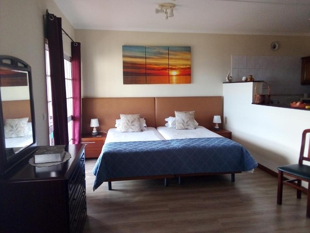 Postel nebo postele na pokoji v ubytování Apartments Vista Oceano