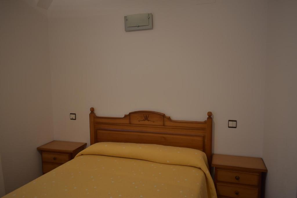 Postel nebo postele na pokoji v ubytování Apartamentos Casa Esperanza - Ordesa