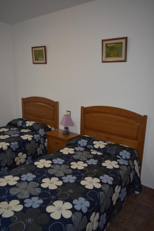 Postel nebo postele na pokoji v ubytování Apartamentos Casa Esperanza - Ordesa