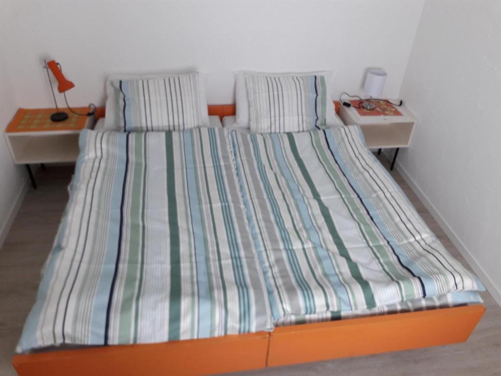 Postel nebo postele na pokoji v ubytování Curtinfess Rezzonico