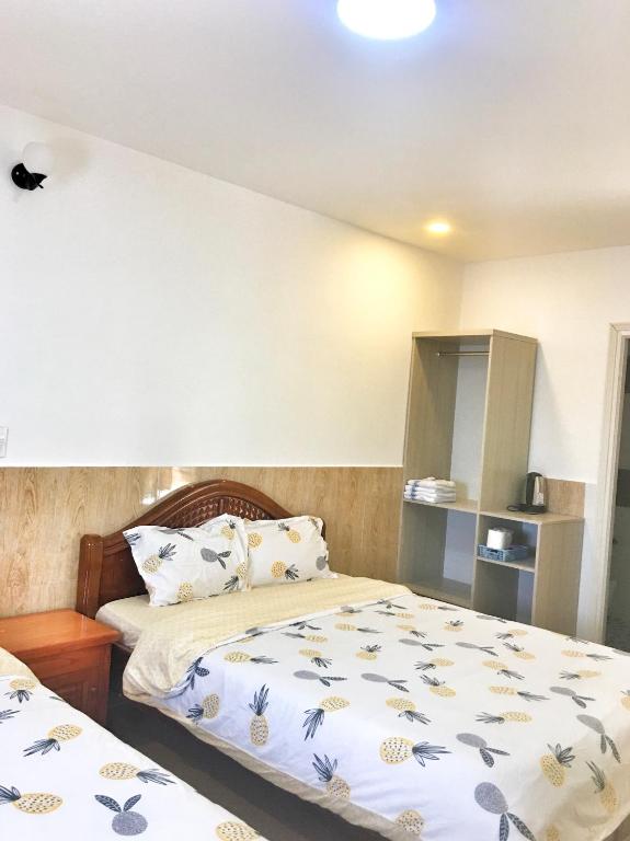 Letto o letti in una camera di Hoang Vu Guest House