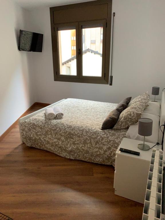 Postel nebo postele na pokoji v ubytování Piso Andorra