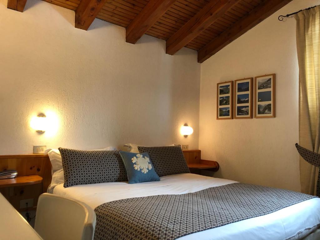 Postel nebo postele na pokoji v ubytování Hotel Ruitor