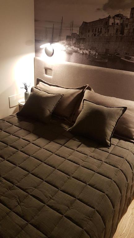 A bed or beds in a room at B&B VISTAZZURRA - Casa Saldarelli