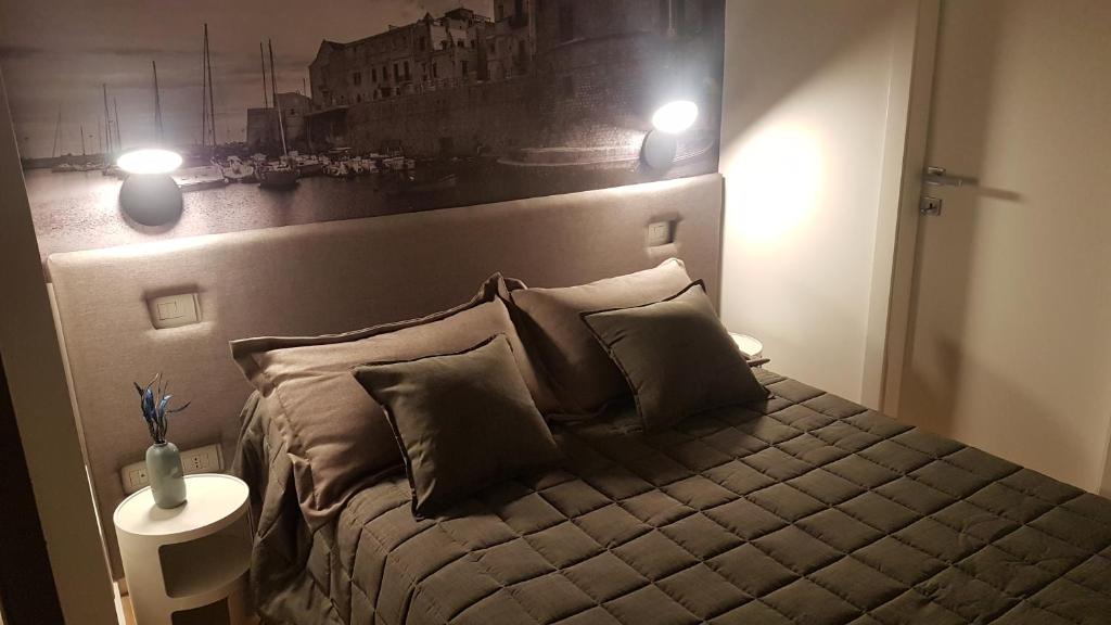 A bed or beds in a room at B&B VISTAZZURRA - Casa Saldarelli