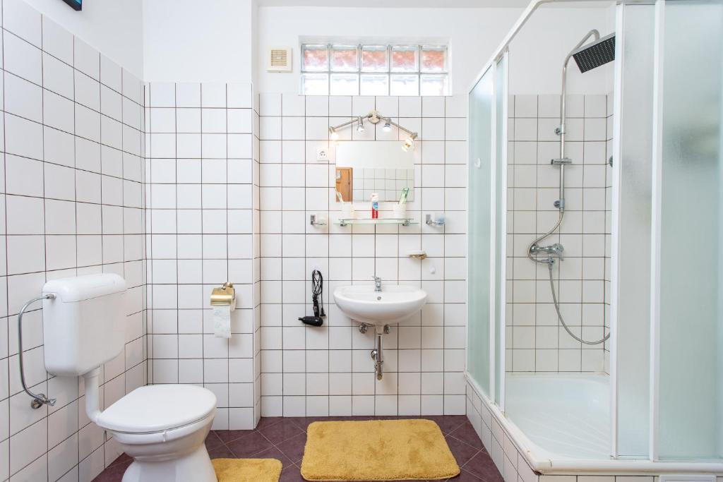 Kúpeľňa v ubytovaní Tip-Top Apartman Ház