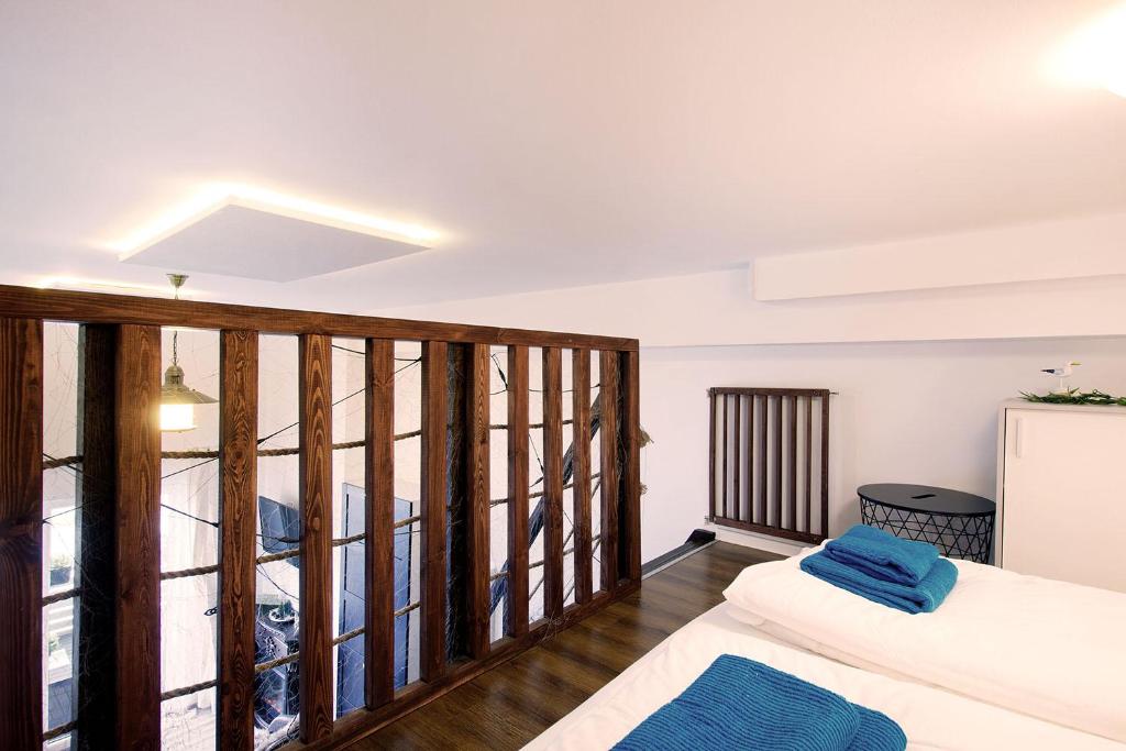 Posteľ alebo postele v izbe v ubytovaní STRANDIDYLLE Apartment mit Meerblick und Kamin