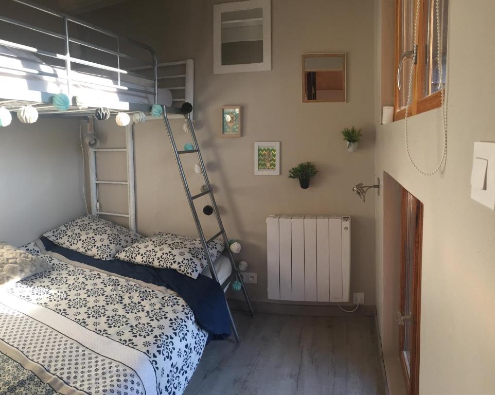 Postel nebo postele na pokoji v ubytování Un petit coin d’Alsace