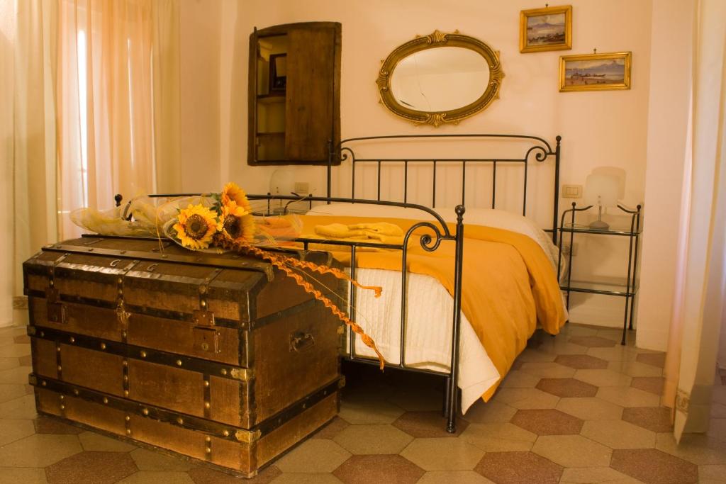 Łóżko lub łóżka w pokoju w obiekcie Nenà Al Borgo Castello