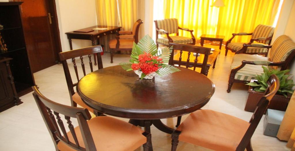 Posezení v ubytování Swosti Palm Resort Gopalpur