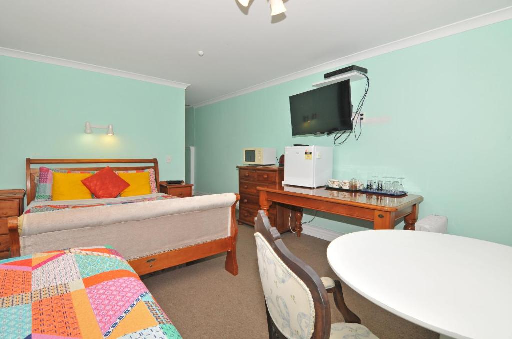 Postel nebo postele na pokoji v ubytování Richmond Guest House