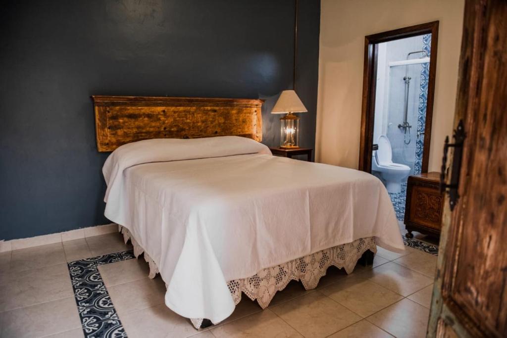 Postel nebo postele na pokoji v ubytování TIERRA SOÑADA HOTEL BOUTIQUE