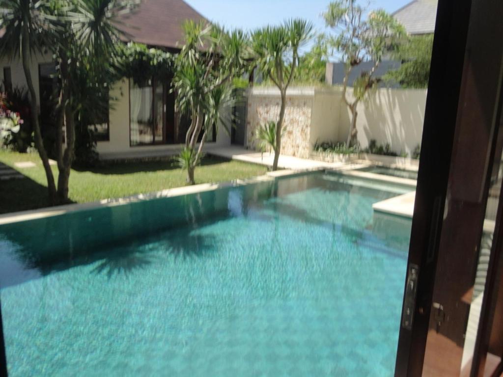 Swimming pool sa o malapit sa Intan Mutiara Sanur Beach Villa