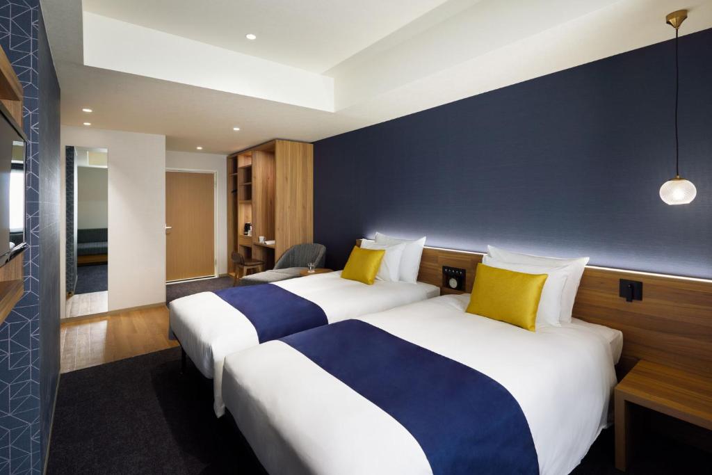 Cama o camas de una habitación en the b akasaka-mitsuke
