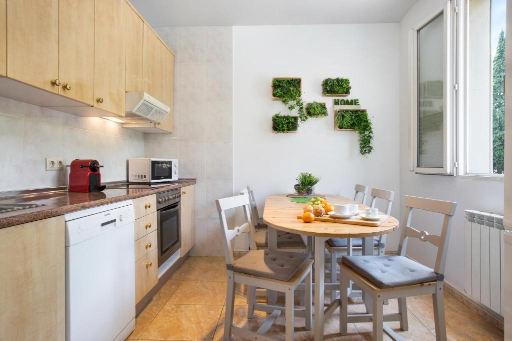 Kuchyň nebo kuchyňský kout v ubytování Stay U-nique Apartments Sicília