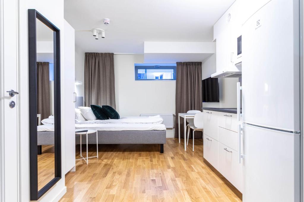 Postel nebo postele na pokoji v ubytování ApartDirect Linköping Vasastaden