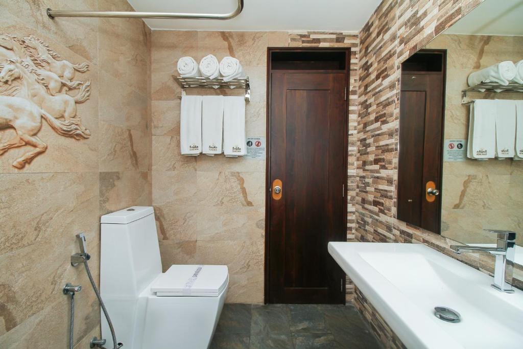 Koupelna v ubytování Sasha Transit Hotel