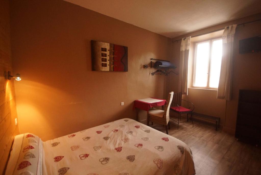 Postel nebo postele na pokoji v ubytování Pension Saint Antoine