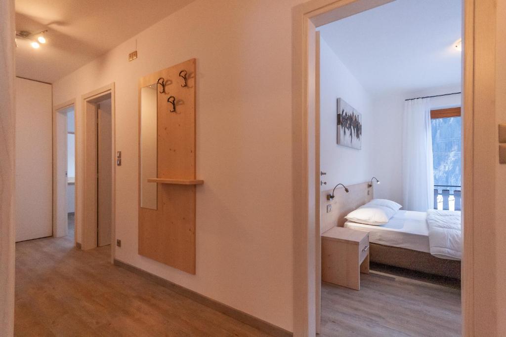 A bed or beds in a room at Casa Zulian