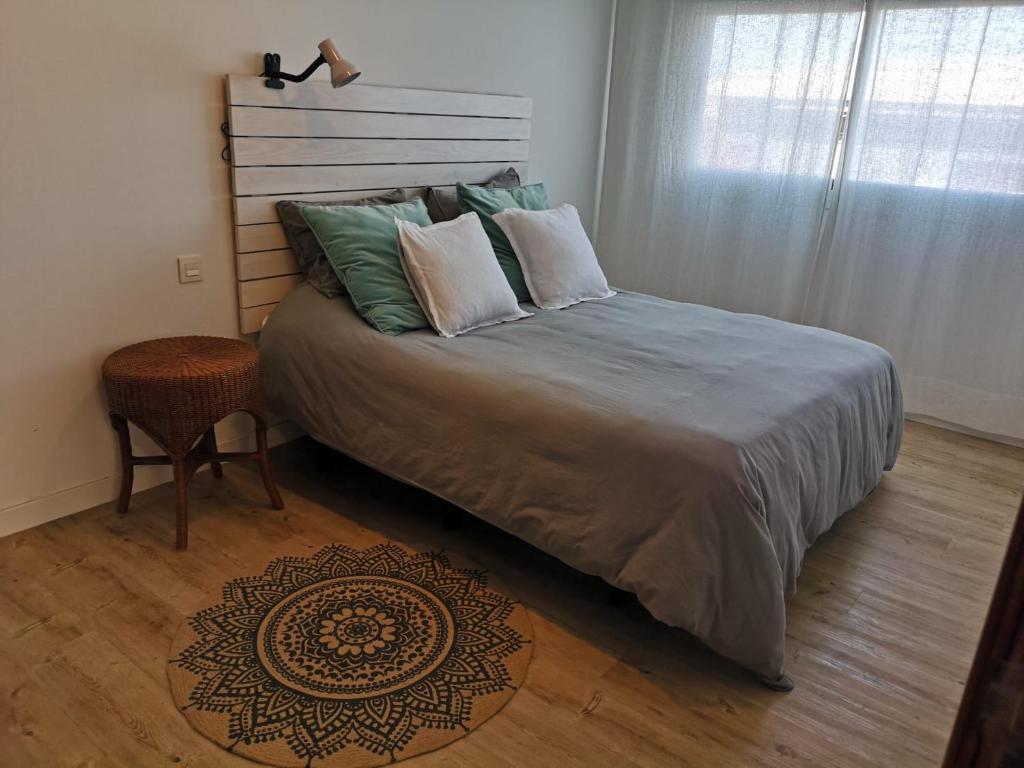 A bed or beds in a room at Casa Capricho