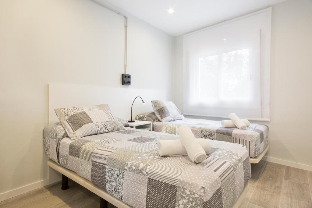 Postel nebo postele na pokoji v ubytování Stay U-nique Apartments Llobregat