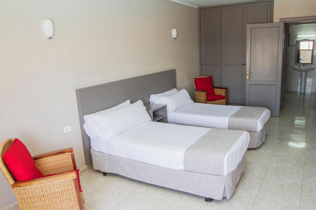 Postel nebo postele na pokoji v ubytování Apartamentos Lanzarote Paradise Colinas