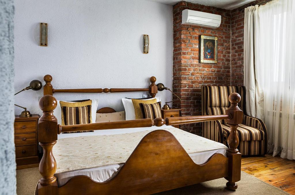 Postel nebo postele na pokoji v ubytování Chateau Copsa Complex