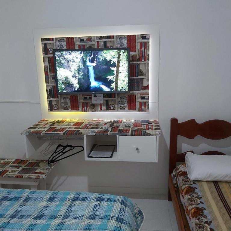 Postel nebo postele na pokoji v ubytování Hotel Pousada Girassol