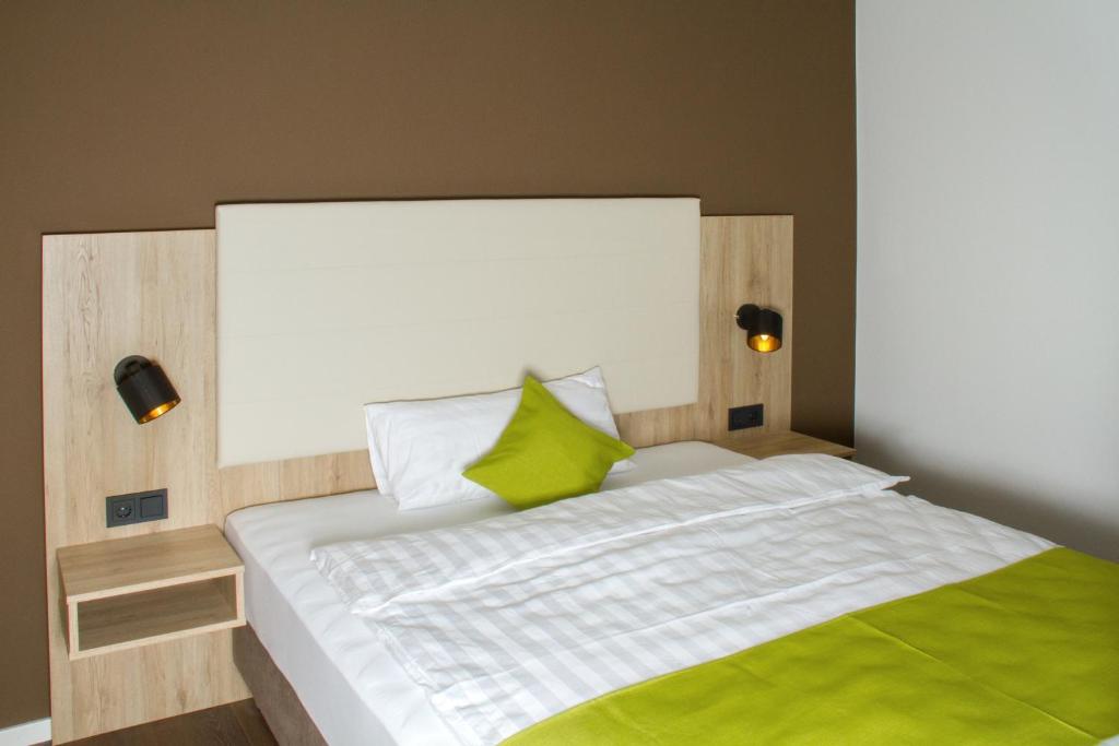 Postel nebo postele na pokoji v ubytování Living Hallertau