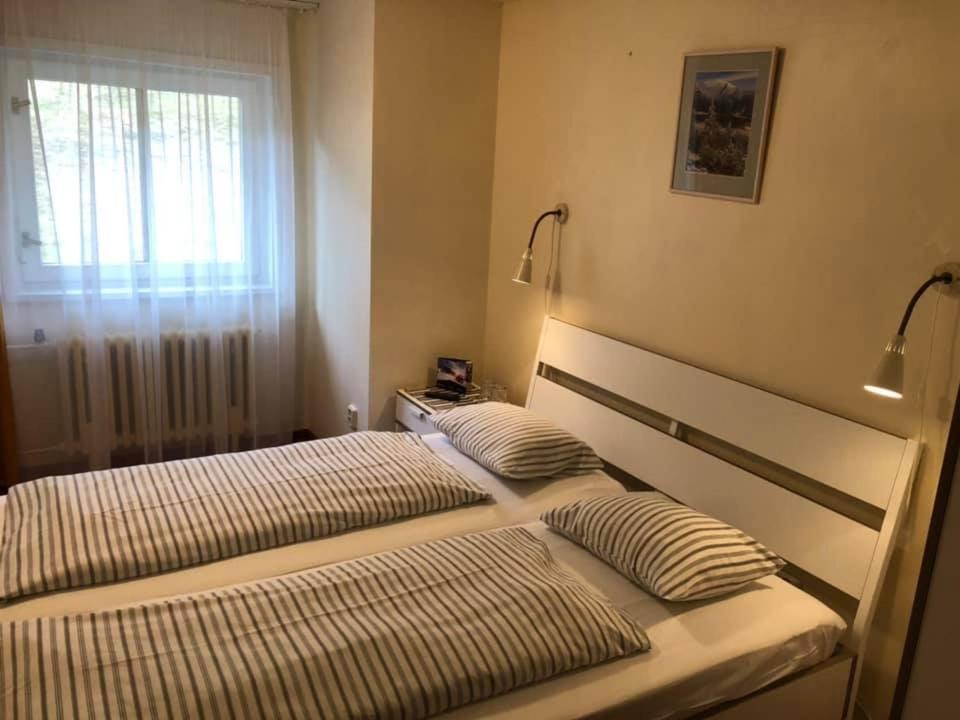 Postel nebo postele na pokoji v ubytování Hotel Hromovka
