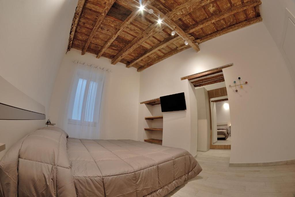 Postel nebo postele na pokoji v ubytování B&B DEL CORSO