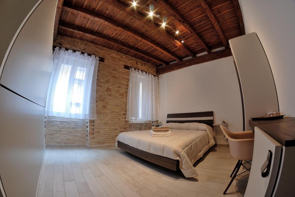 Postel nebo postele na pokoji v ubytování B&B DEL CORSO