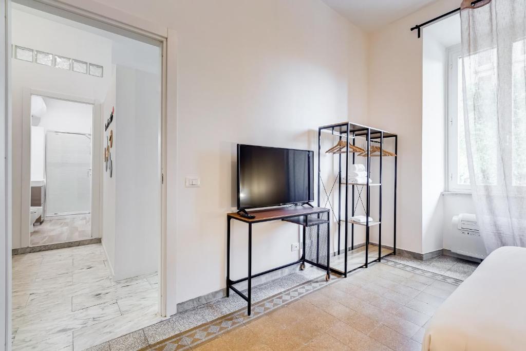 Łóżko lub łóżka w pokoju w obiekcie BDC - Termini Sun Apartment