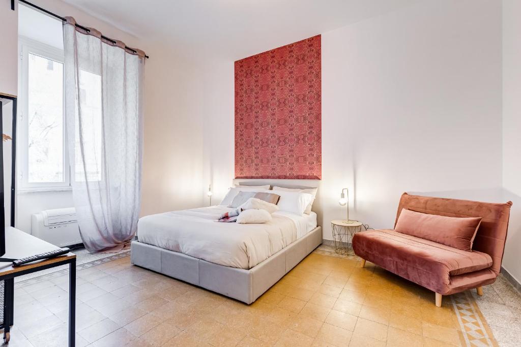 Łóżko lub łóżka w pokoju w obiekcie BDC - Termini Sun Apartment