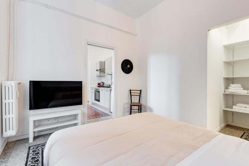 Łóżko lub łóżka w pokoju w obiekcie BDC - Termini Sun Apartment
