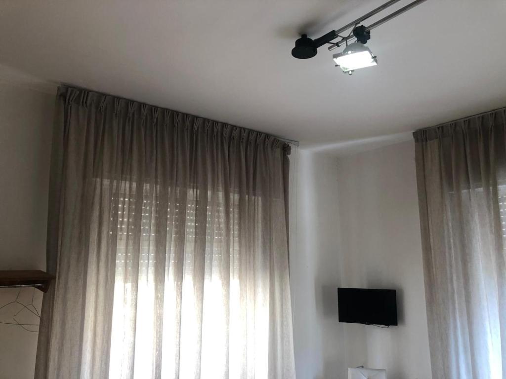 TV a/nebo společenská místnost v ubytování B&B Degli Artisti Suite
