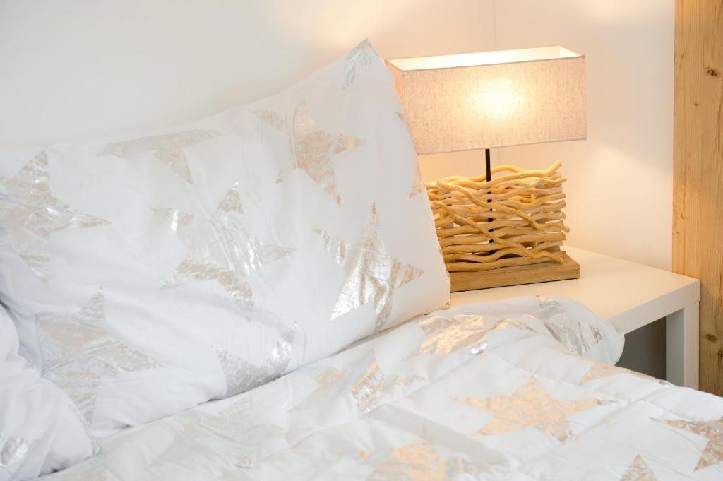 Postel nebo postele na pokoji v ubytování Hotel Bellevue