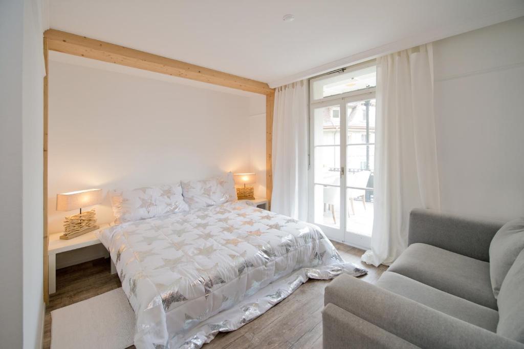 Postel nebo postele na pokoji v ubytování Hotel Bellevue