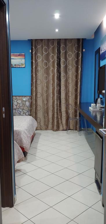 TV a/nebo společenská místnost v ubytování Sorrento Relais