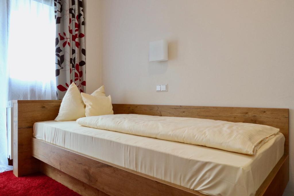 Postel nebo postele na pokoji v ubytování DEVA Hotel Renchtalblick