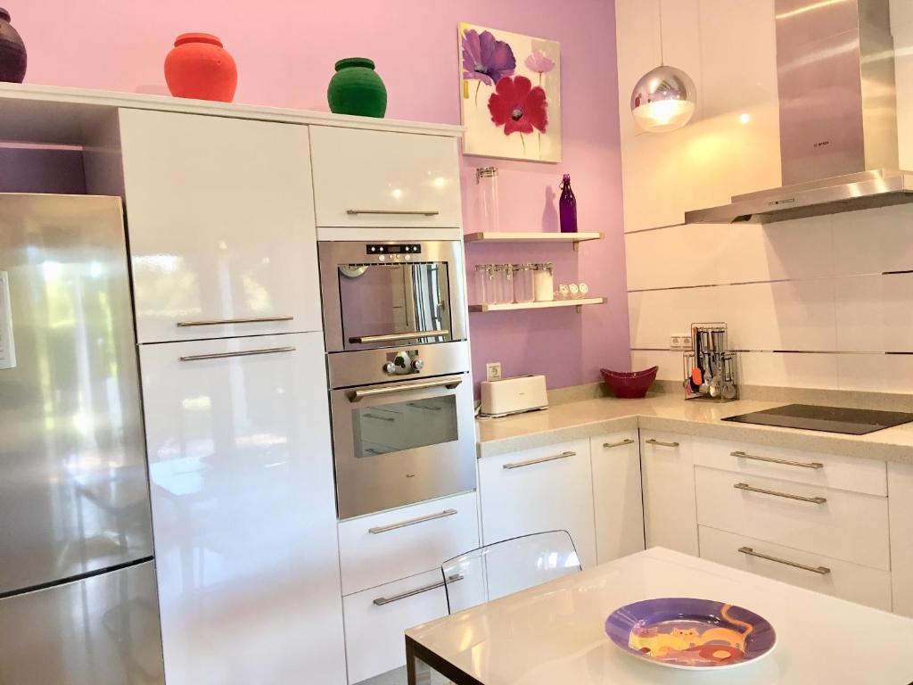 Kuchyň nebo kuchyňský kout v ubytování Villa Dorotea