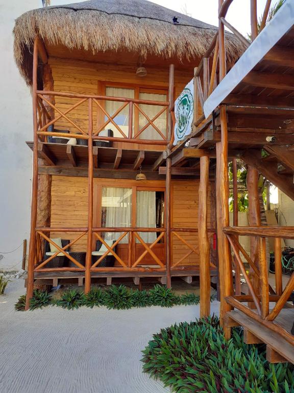 Balkón nebo terasa v ubytování Palmeras de Mahahual Cabañas