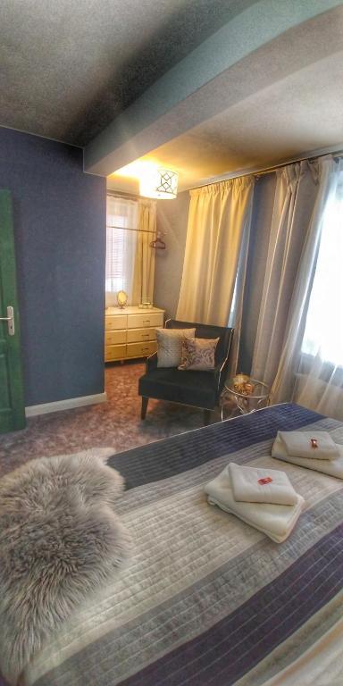 Postel nebo postele na pokoji v ubytování Hotel Telč